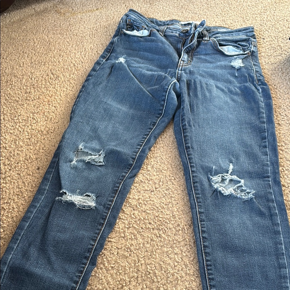 Distressed Blue Jeans